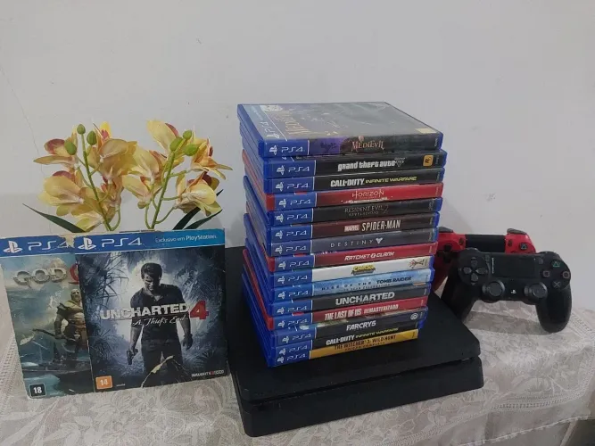 Ps4 slim 1tb (2) controles e 17 jogos originais
