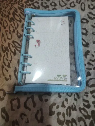 Fichário pequeno transparente e azul