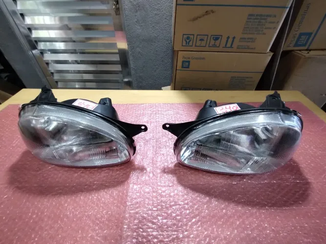 Par farol Corsa carcaça preta 1994 2000 novo importado CD 340