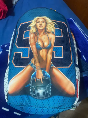 Mochila Sprayground Loira Futebol Americano
