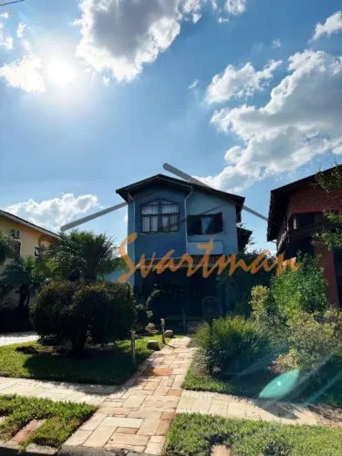 Sobrado com 4 dormitórios, sendo 3 suítes à venda, 340 m² por R$ 2.100.000 - Condomínio Re