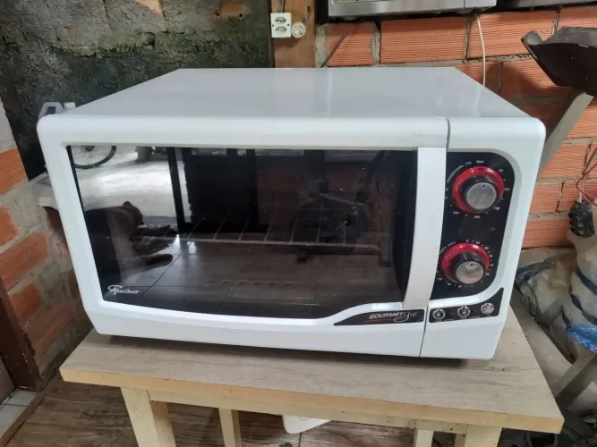 Forno elétrico Fischer 44L funcionando tudo certinho.