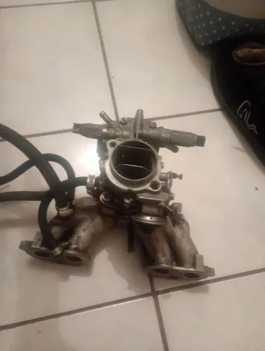 Vendo carburador Weber 190 com coletor de admissão juntoem bom estado QR 500 reais