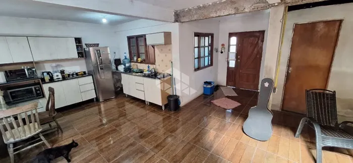 Casa à venda de 216m² no bairro Estância Velha, Canoas, com 3 quartos (2 suítes)