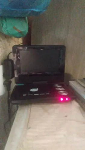 Dvd portátil dazz com defeito 