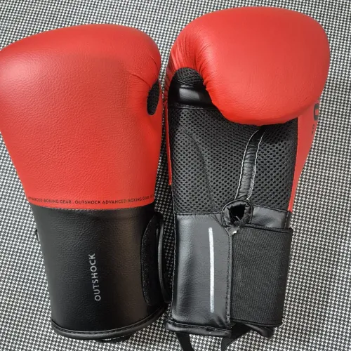 Luva de boxe<br>Marca: Outshock
