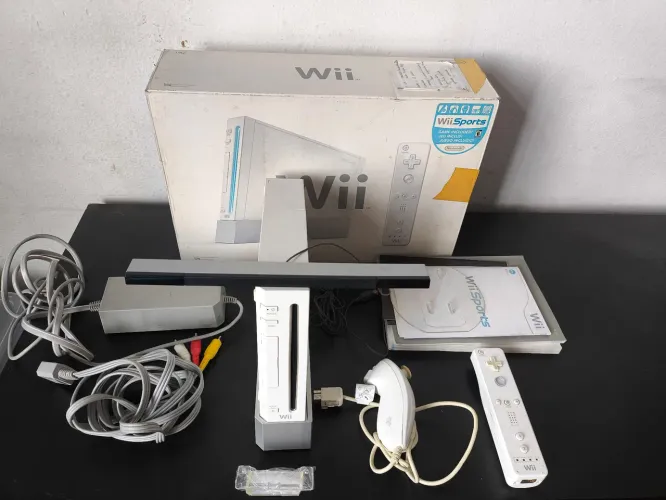 Leia o anúnciosomente vend nintendo wii usado com marcas de uso com jogos