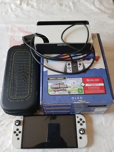 Nintendo oled+cartão de memória e estojo