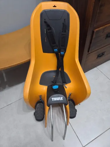 Cadeirinha infantil Thule RideAlong para bicicleta, original, resistente e confortável.