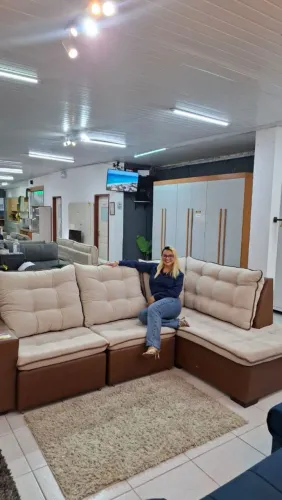 Sofá retrátil e reclinável de canto tamanho família.