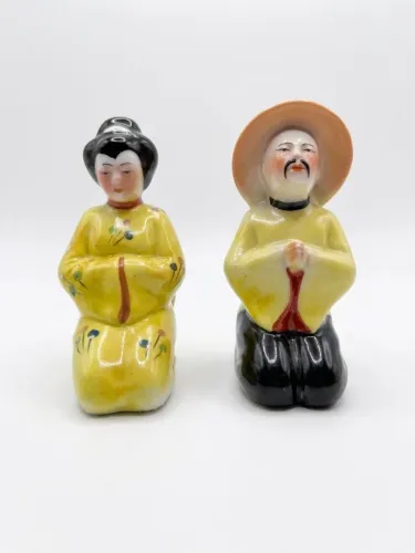 Casal da fortuna de em porcelana japonesa