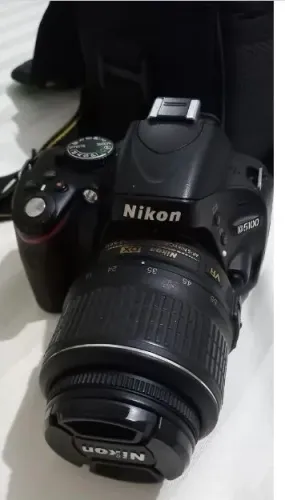 Lente nikon 18-55mm manual como nova