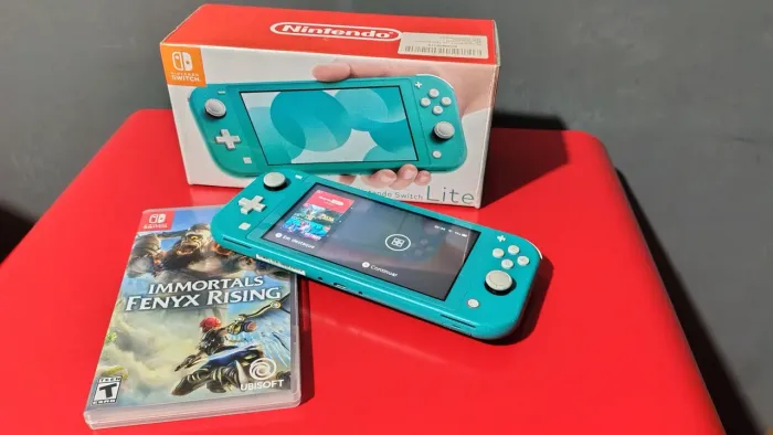 Nintendo Switch Lite + Caixa e carregador originais + Jogo Mídia Física