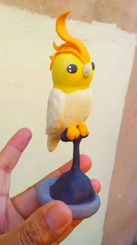 Calopsita feito em biscuit totalmente artesanal 