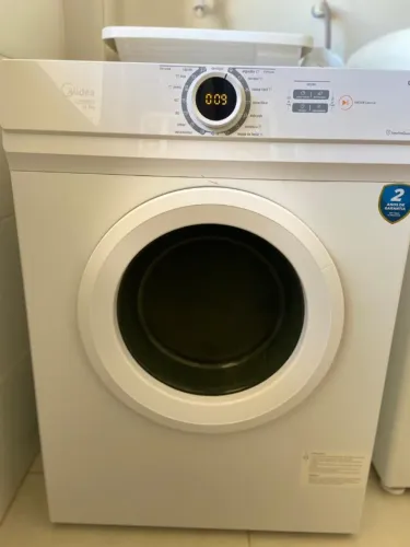 Máquina de secar roupas