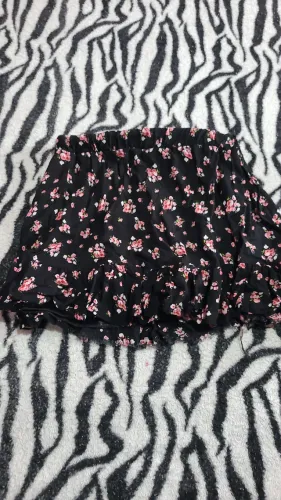 Saia preta florida veste p/m