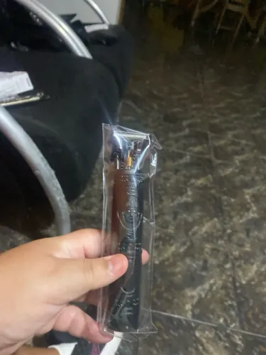 Máquina de cortar cabelo do dragão