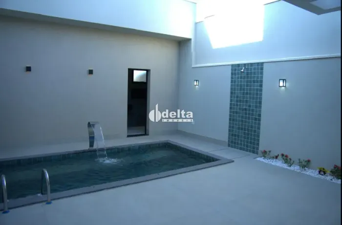 Casa residencial com 3 suítes disponível para venda no bairro Novo Mundo em Uberlândia-MG