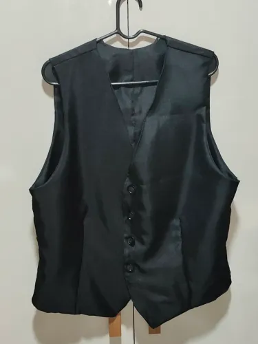 Colete tamanho 54 cor preto.