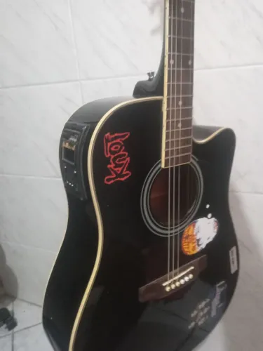 Violão de aço, acústico sonoridade excelente barbada vem com bandoleira e capa