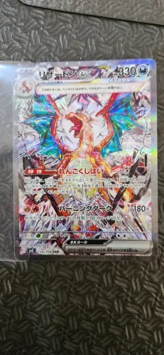 Carta Pokémon Charizard EX SAR 134/108