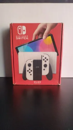 NINTENDO SWITCH OLED BLOQUEADO+JOGOS( SEMI-NOVO NA CAIXA) SOMOS LOJA NO CENTRO DE CAXIAS