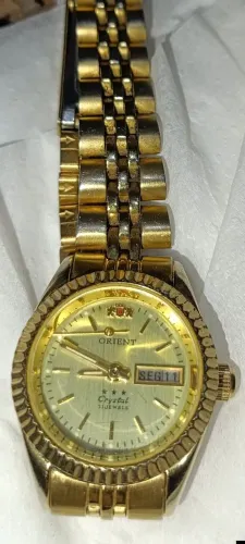 Relógio original marca orient com defeito
