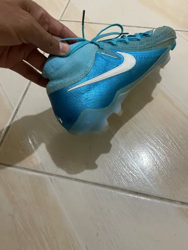 Chuteira Nike profissional 399 reais 