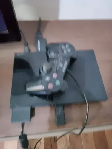 Troca um play2 por um violão eletrico em bom estado com capa e e cabo.