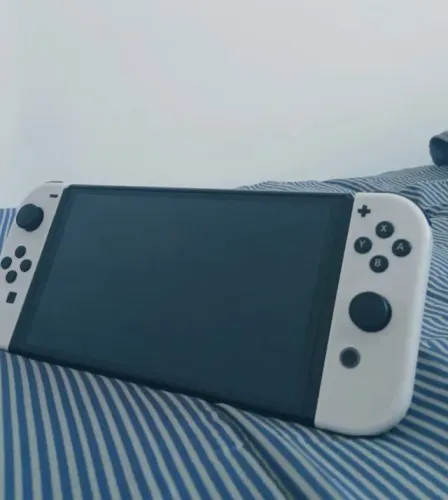 ? Vendo Nintendo Switch OLED Estou vendendo meu Nintendo Switch OLED, em ótimo estado e