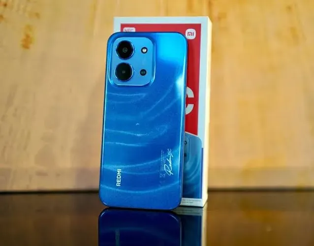 Vendo celular redimi 15c semi. Novo