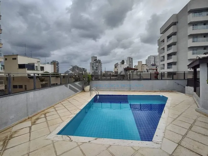 Apartamento com varanda e lazer na Praia da Enseada, Guaruja