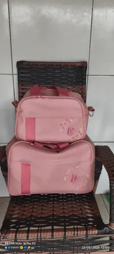 Mala maternidade cor rosé 