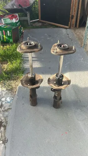 Amortecedor dianteiro e cochio Corolla 