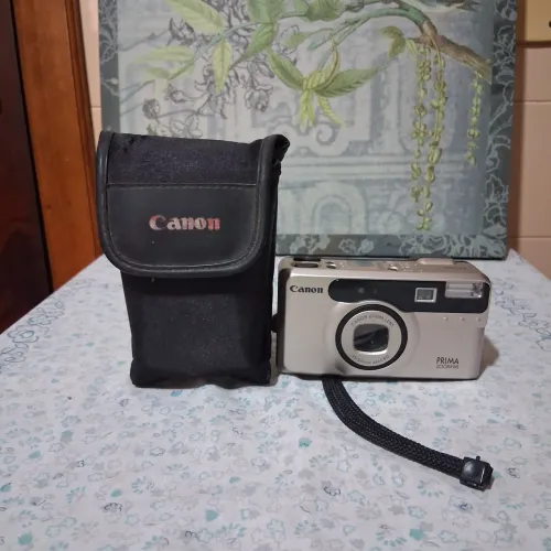 Câmera Canon prima zoom 60 com capa.