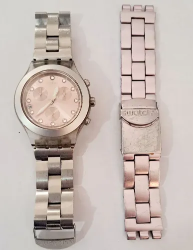 Relógio swacth original unissex com pulseira extra.
