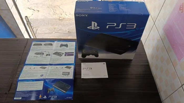 Caixa ps3 super slim+ manuais