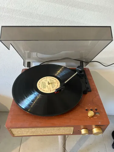 Toca-Discos Raveo + 6 discos inclusos!!