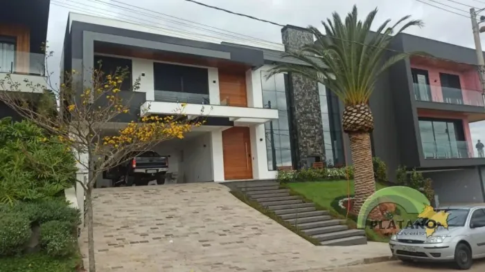 CASA EM CONDOMÍNIO COM 3 DORMITÓRIOS, 2 VAGAS, 408M² ÁREA PRIVATIVA À VENDA EM ENCOSTA DO
