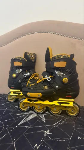 Oxer Freestyle In-line cores preto e dourado