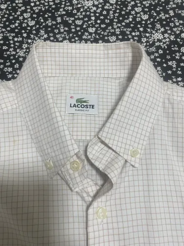 Vendo camisa Lacoste Manga comprida .