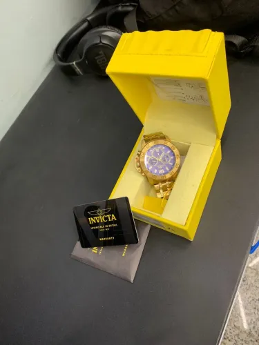 vendo invicta dourado original