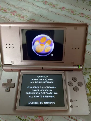 Vendo Nintendo DS Lite rosa + 3 jogos. Usado em bom estado