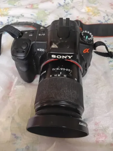 Camera Sony A200 e Lente 18-70mm?Corpo com falha no automático)