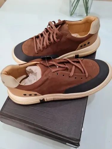 Tenis osklen tamanho 43 novo sem uso ..original.