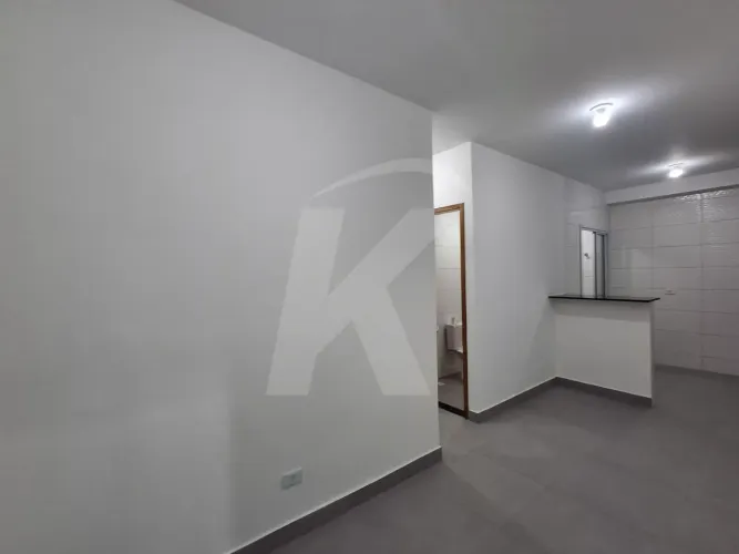 Apartamento com 2 quartos, sala, cozinha, banheiro e área de serviço.