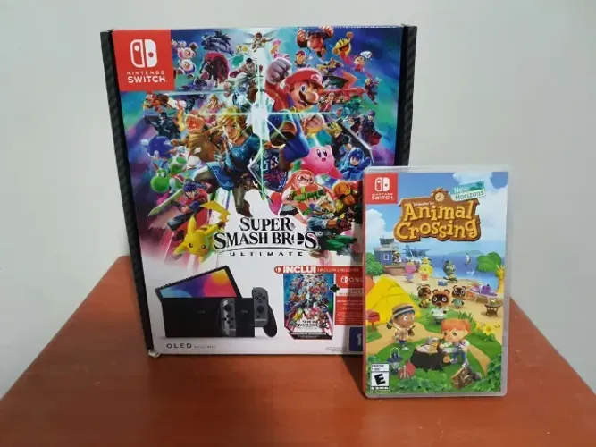 Nintendo Switch OLED Edição Colecionador Smash Bros Jamais Jogado + Jogo Animal Crossing
