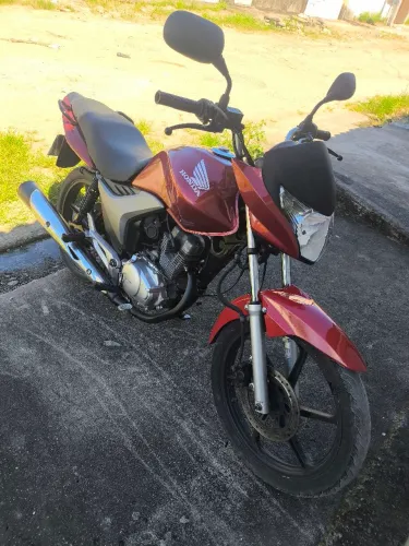Vendo Titan ex 2013 já com placa Mercosul em meu nome.