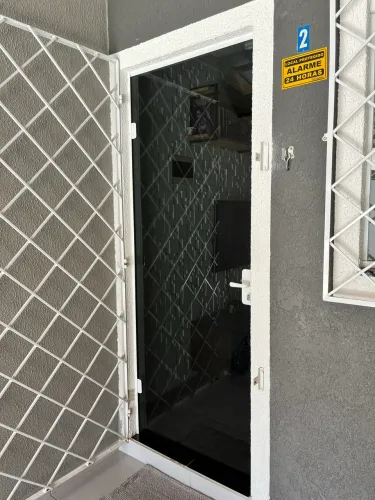 Porta de vidro temperado fumê