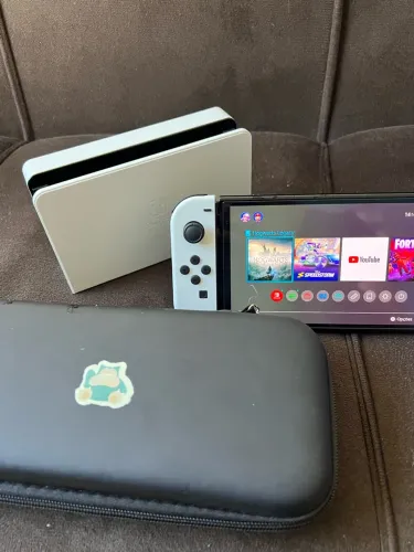 NINTENDO SWITCH OLED 64GB + CARD DE 128GB